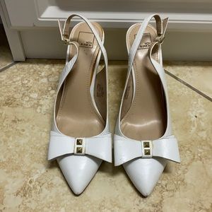 14th & union heels with a cute bow in front.